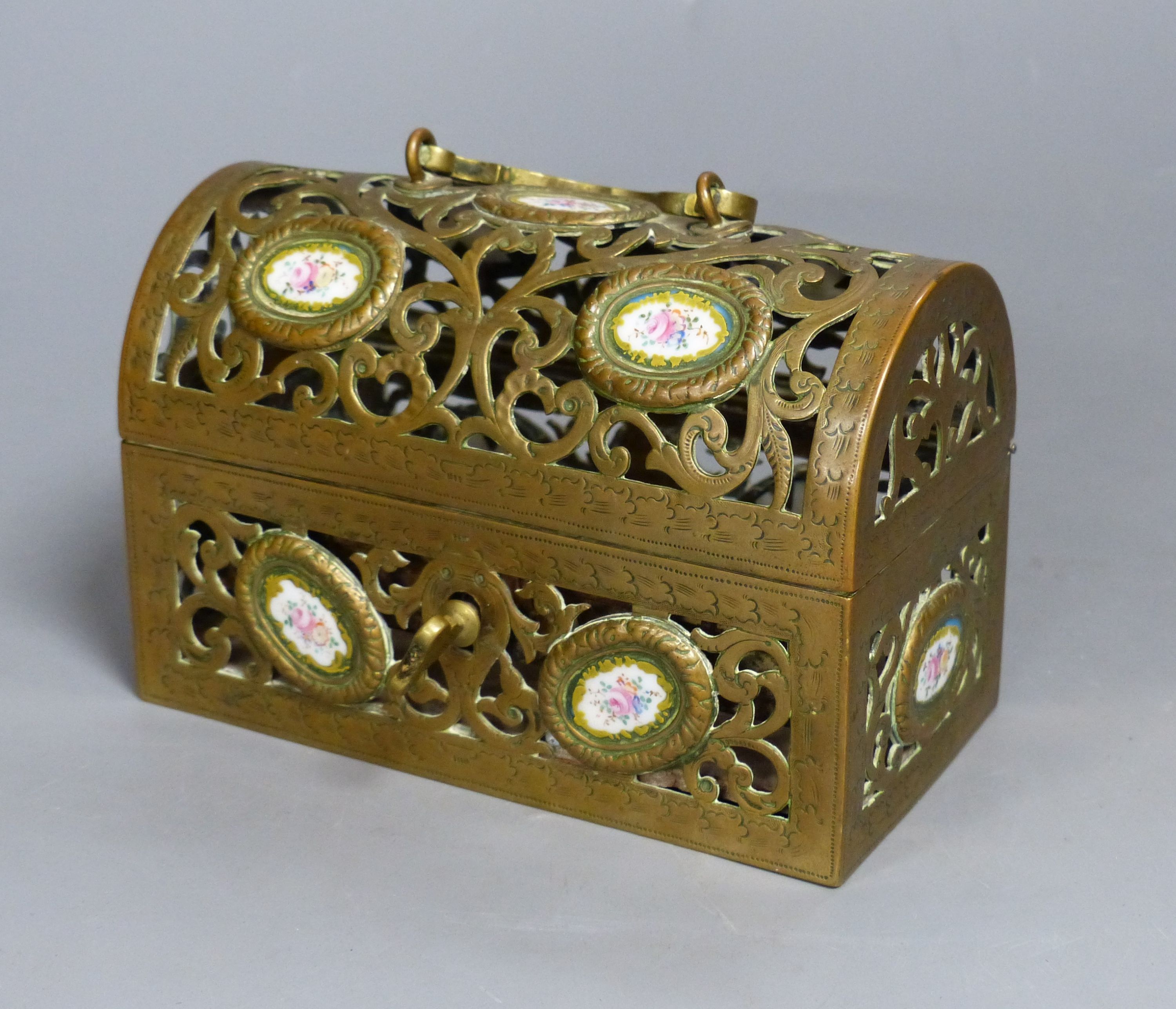 A 19th century French pierced and engraved bronze and enamel casket, 14cm